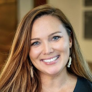 Portrait of Emily Matthews, Realtor®.