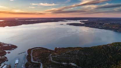 Aerial view over Lake Travis reservoir during sunset, Texas